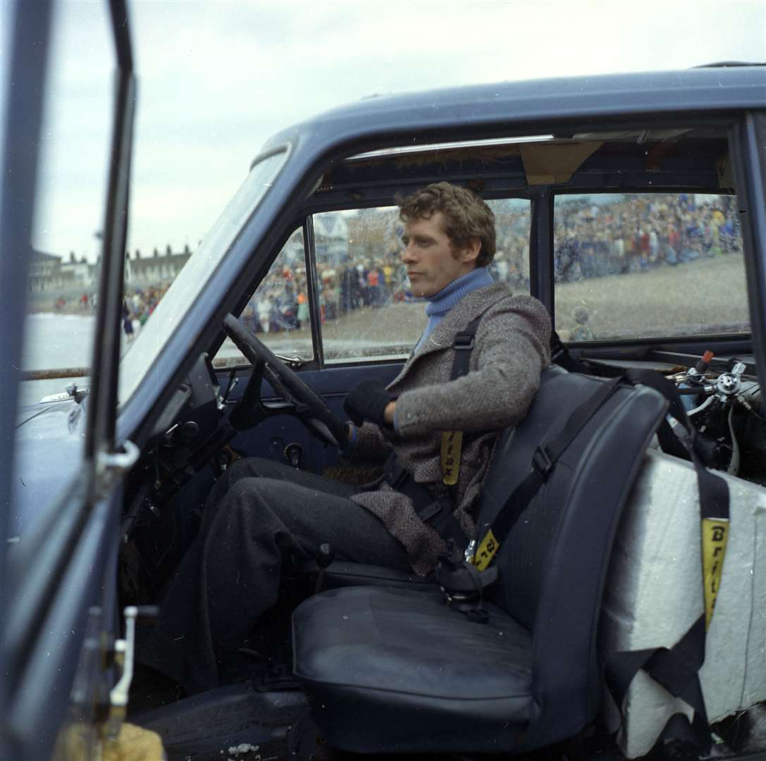 Michael Crawford preparing for his Some Mothers Do 'Ave 'Em stunt off Sheerness buckles up in the Hillman Imp. Picture: Barry Hollis
