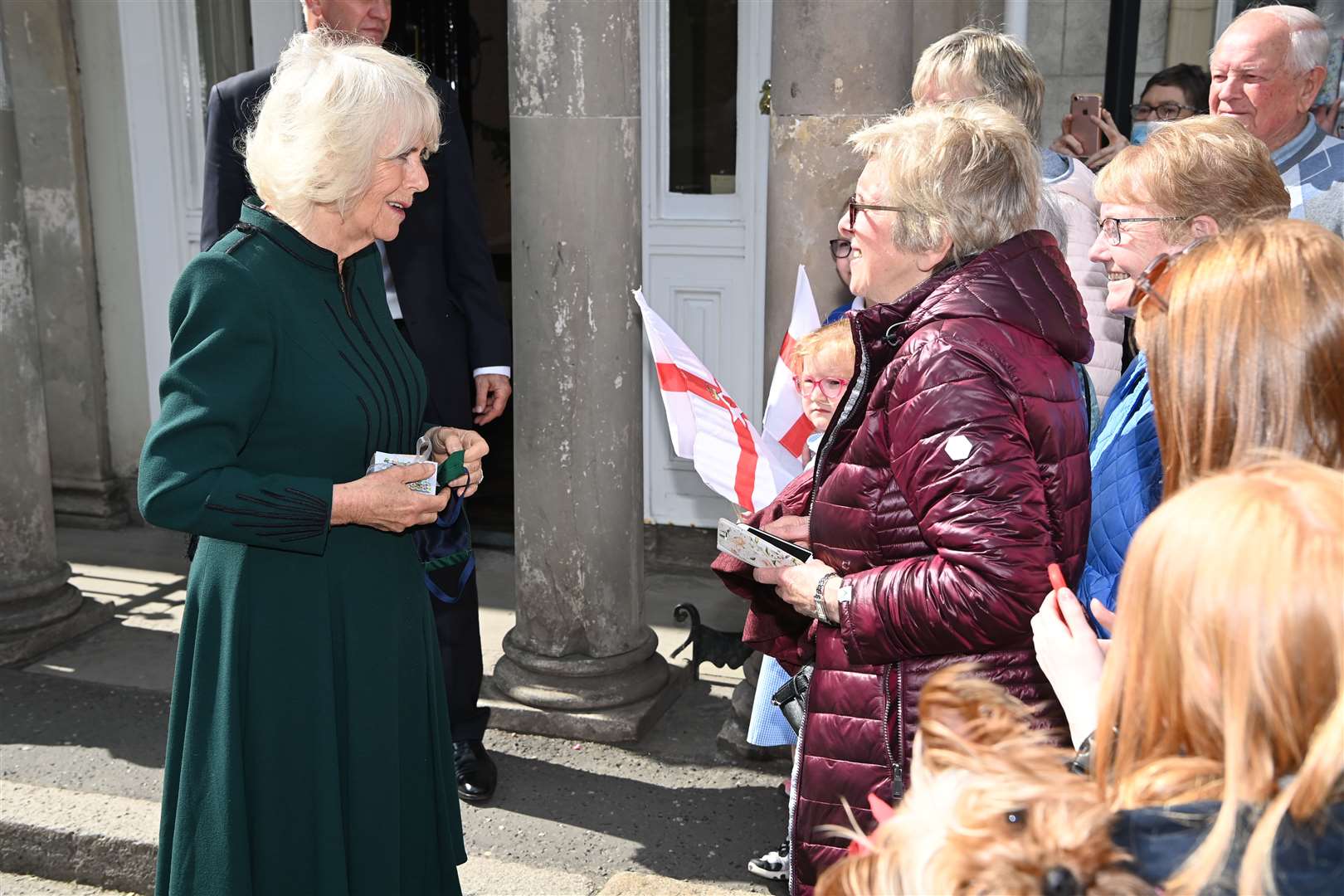 The Duchess of Cornwall meets members of the public, during a visit to Cara Murphy’s workshop in Hillsborough (Tim Rooke/PA)