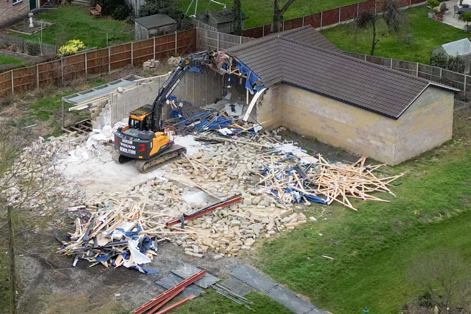 A spa pool block at the home of Hannah Ingram-Moore is demolished (Jacob King/PA)