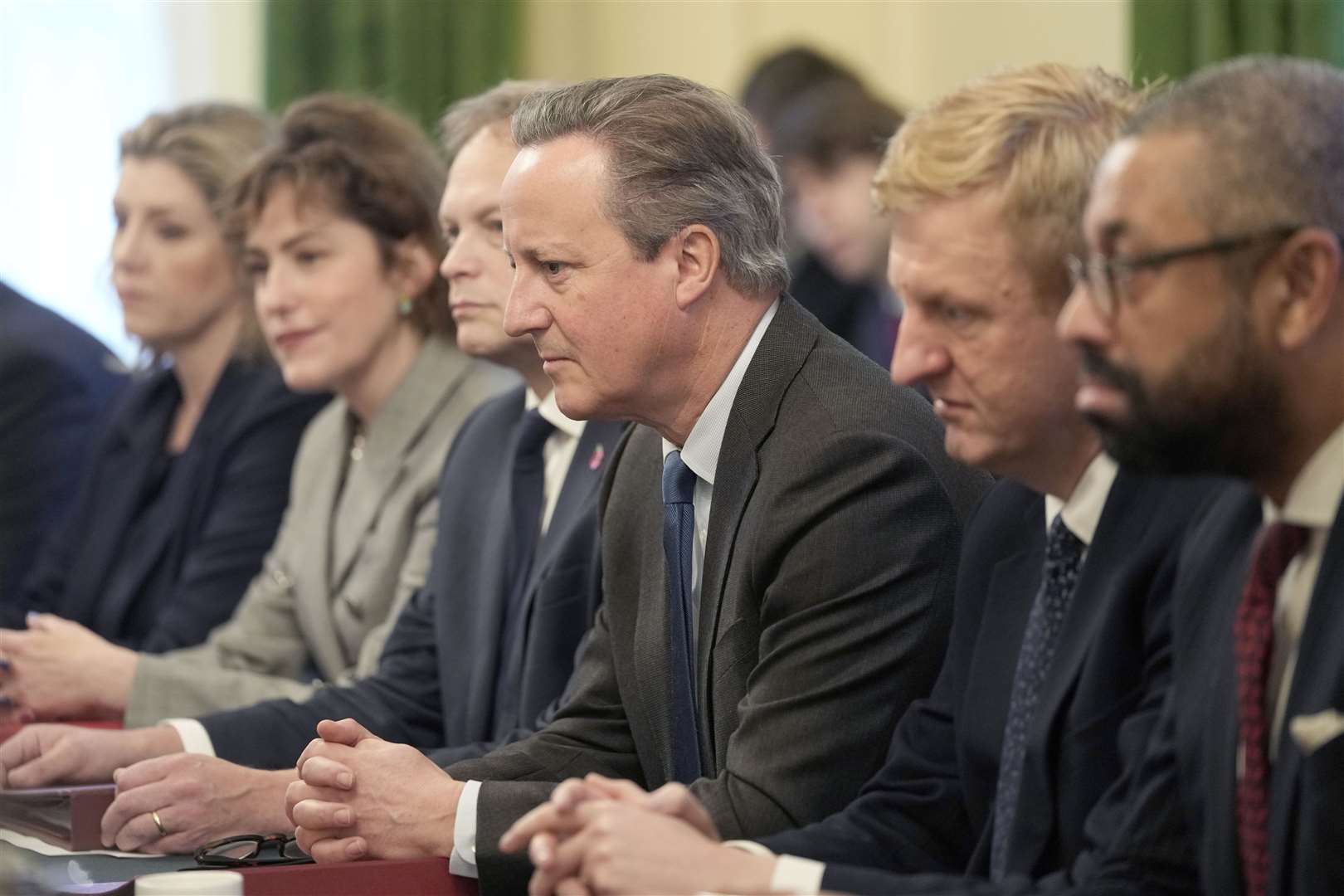 Lord Cameron and James Cleverly with fellow members of the Cabinet (Kin Cheung/PA)