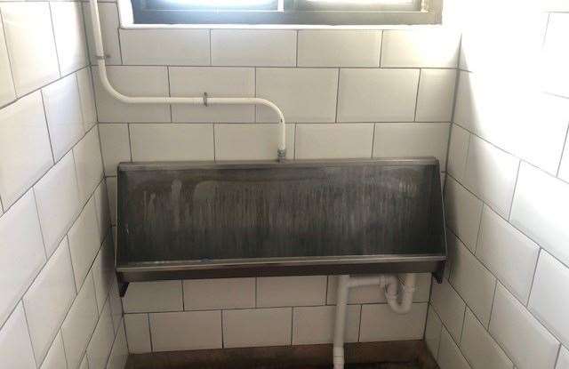 Large white tiles and a small stainless steel urinal, the gents is as traditional as the rest of the pub