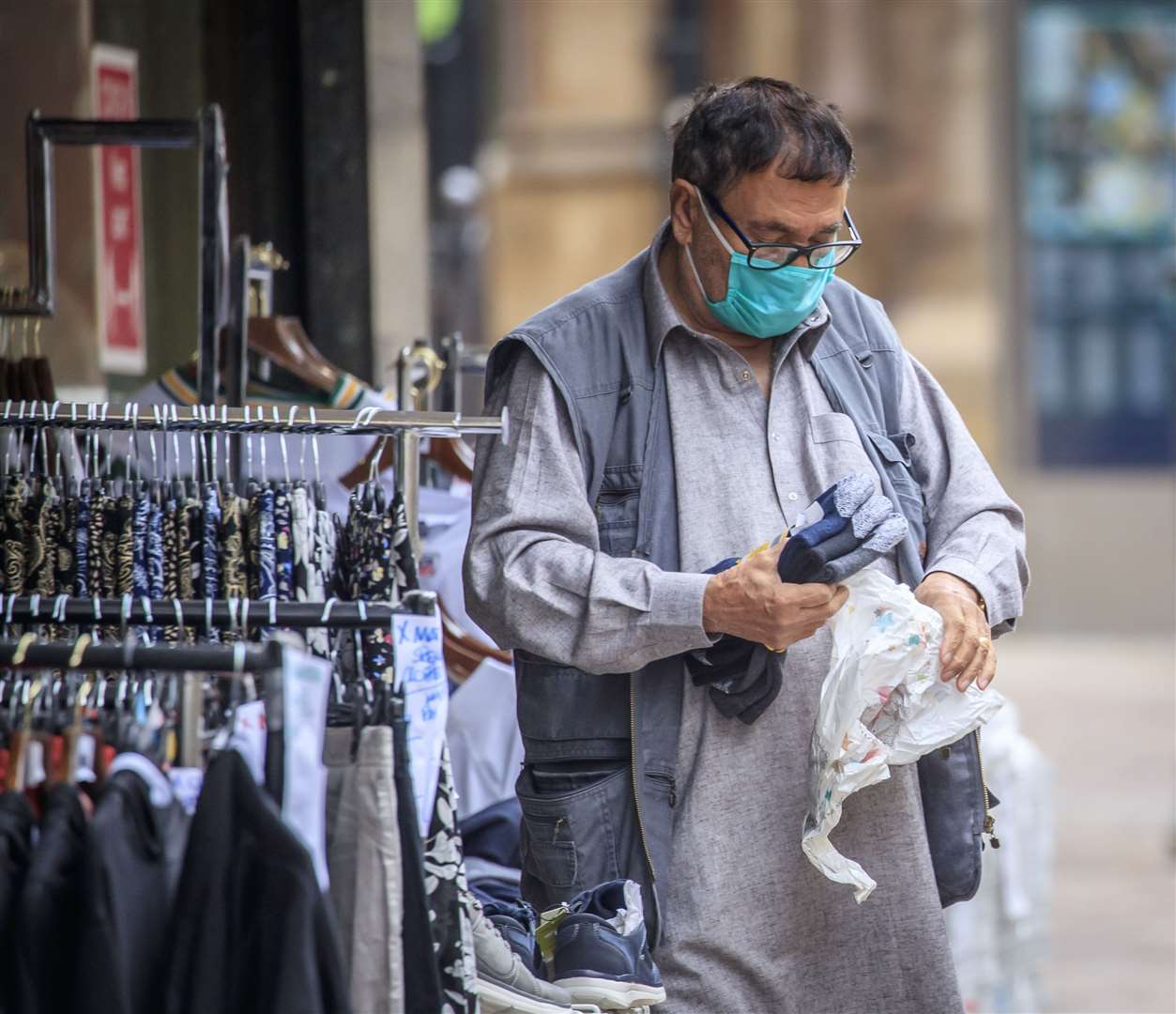 A member of the public wears a face mask in Bradford (Danny Lawson/PA)