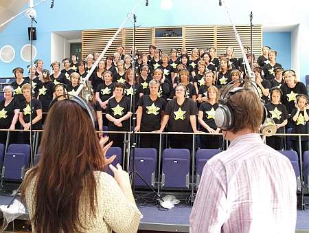 The Rock Choir records some of the album.
