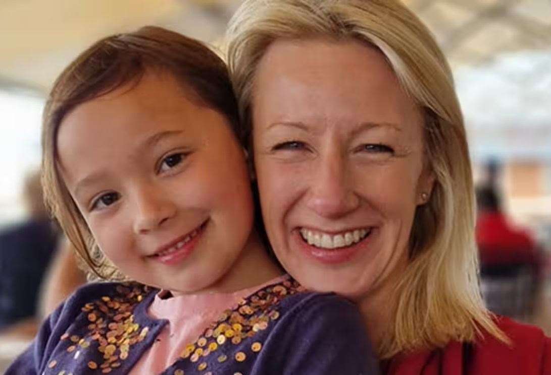 Headteacher Emma Pattison with her seven-year-old daughter, Lettie. Picture: Surrey Police