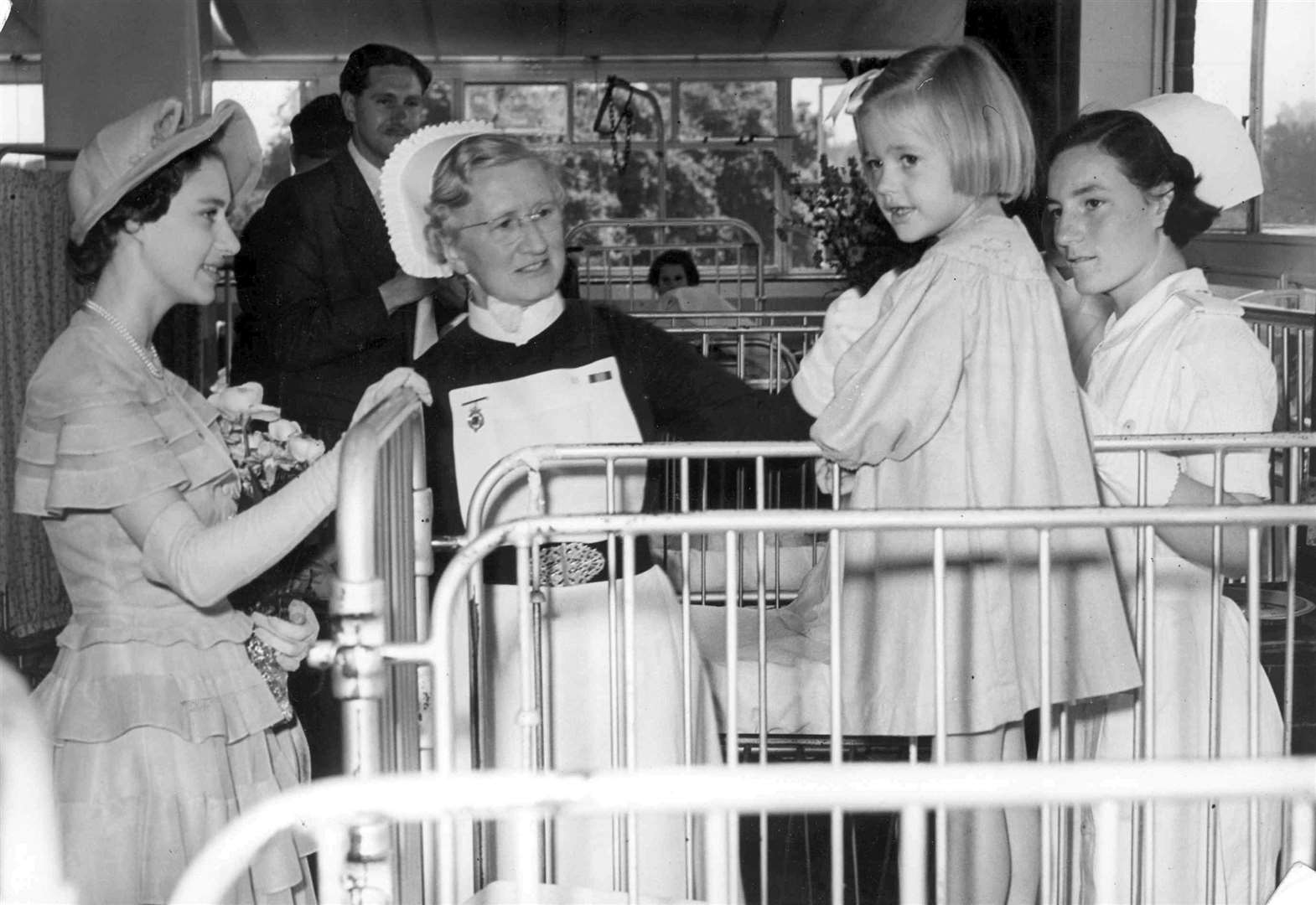 Princess Margaret speaking to child patient Monica Ellenden at the Royal Victoria Hospital in Folkestone, July 1952. Picture: Images of Royal Kent KM book