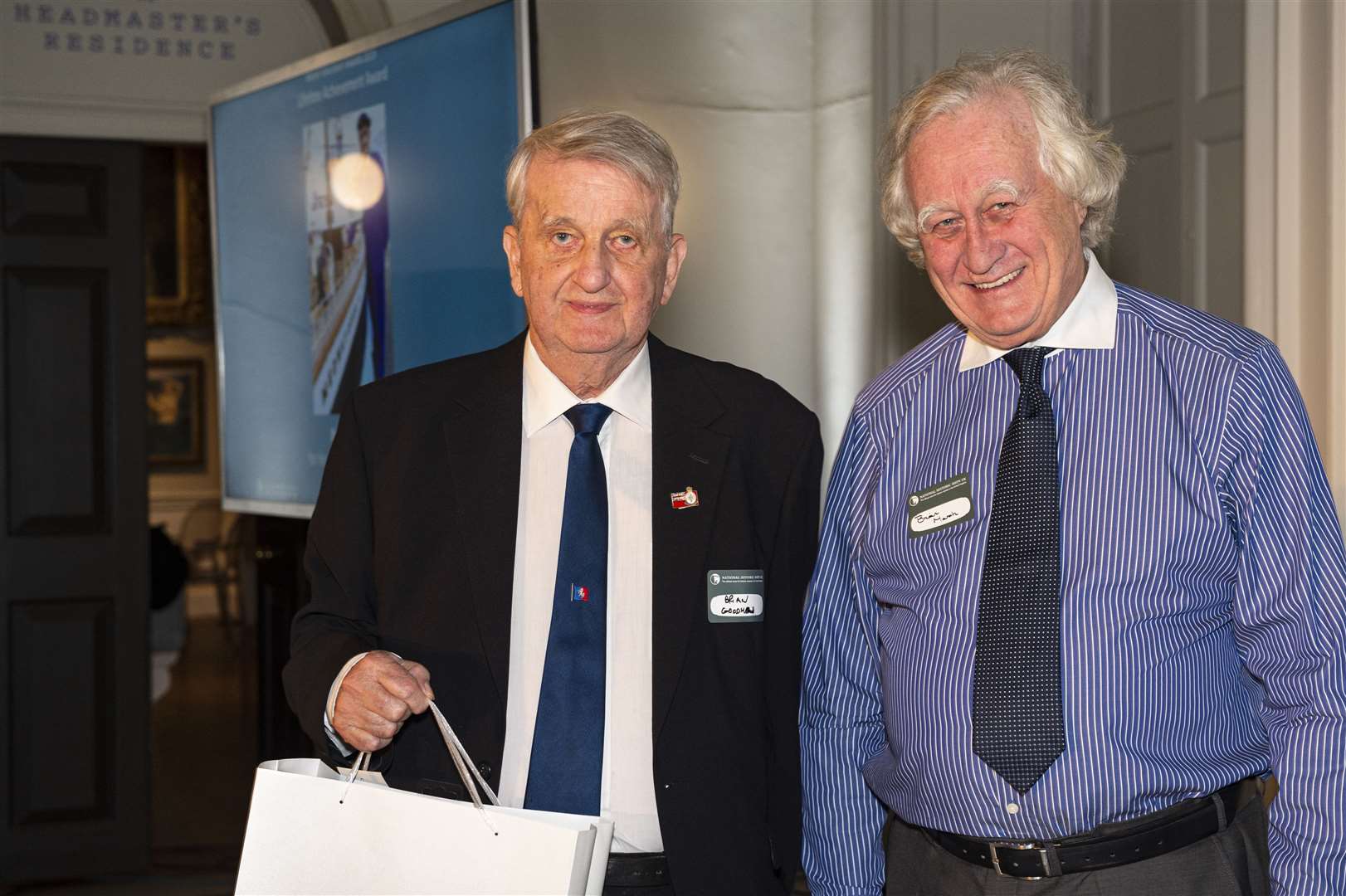 Brian Goodhew, left, receives lifetime award from Brian Marsh