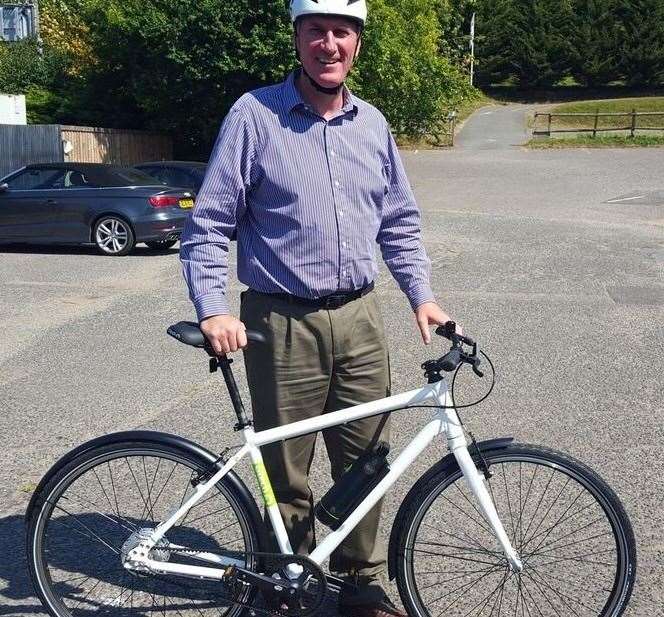 Corinthian CEO Simon Wright with an electric bike