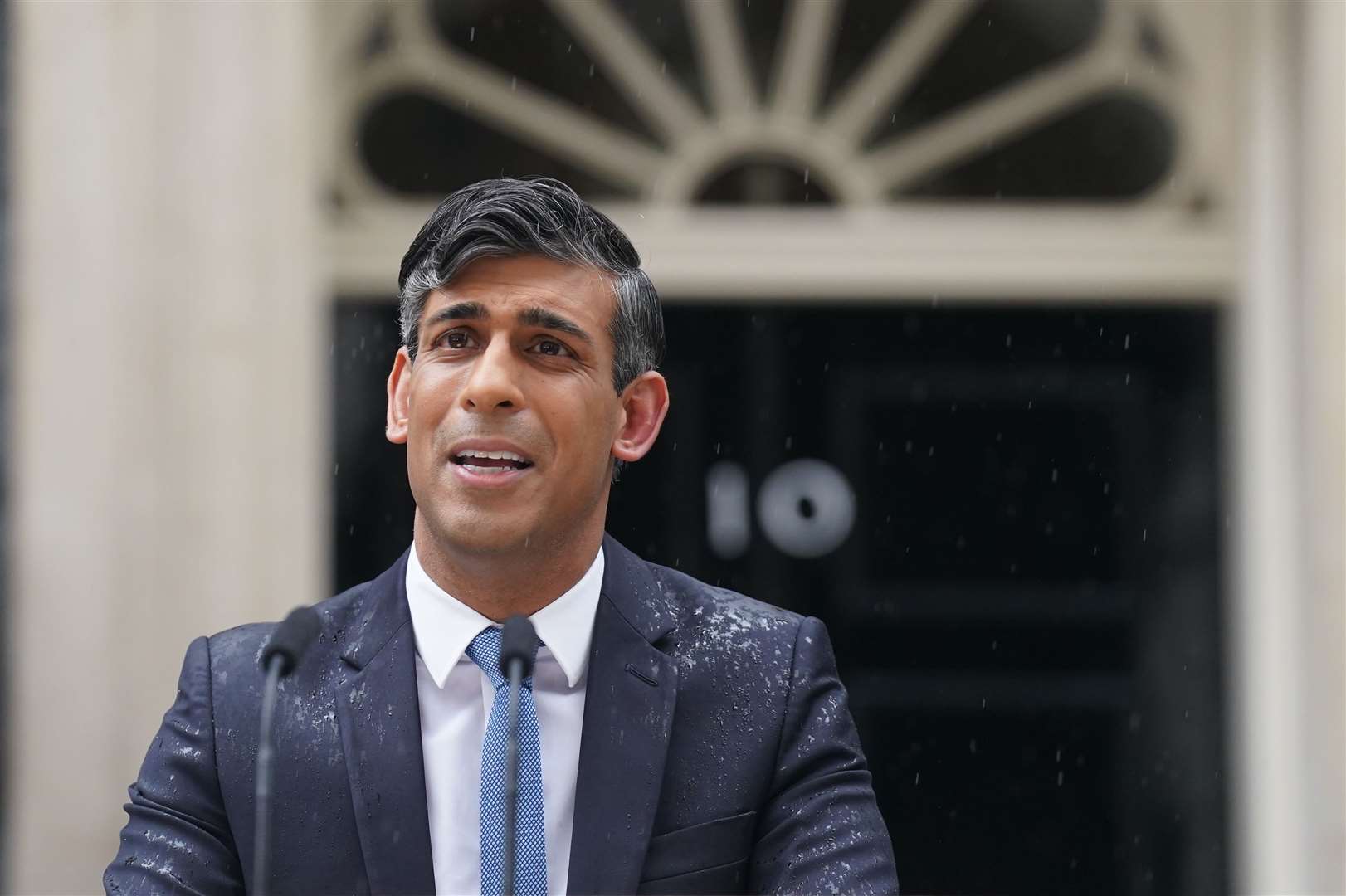 Sir Keir Starmer said it was ‘farcical’ for Rishi Sunak to claim to be the only person with a plan after ‘standing in the rain without an umbrella’ (Stefan Rousseau/PA)