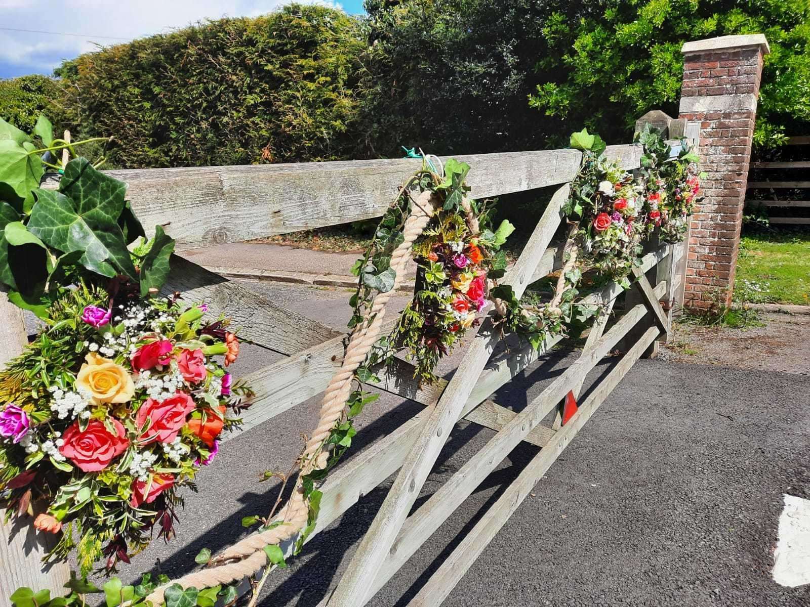 This ivy rope and bloom drape was hung from a garden gate by a member of Deal & District Flower Club