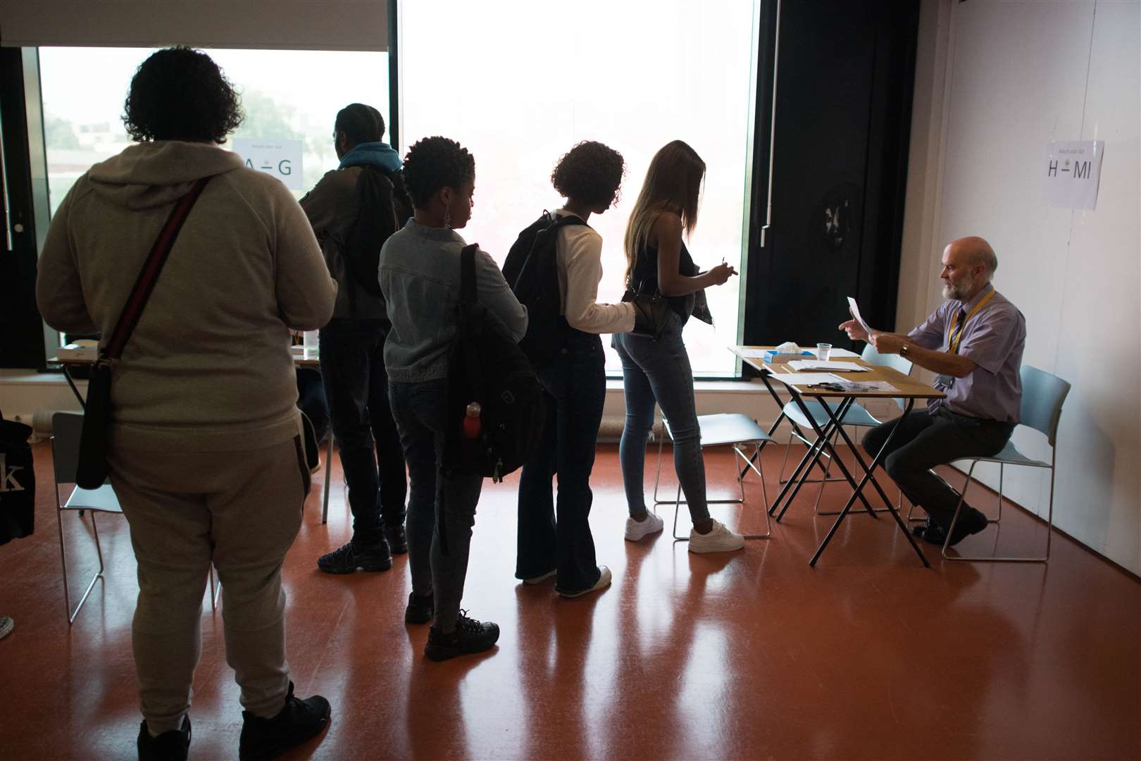 Students receive their A-level results (Stefan Rousseau/PA)