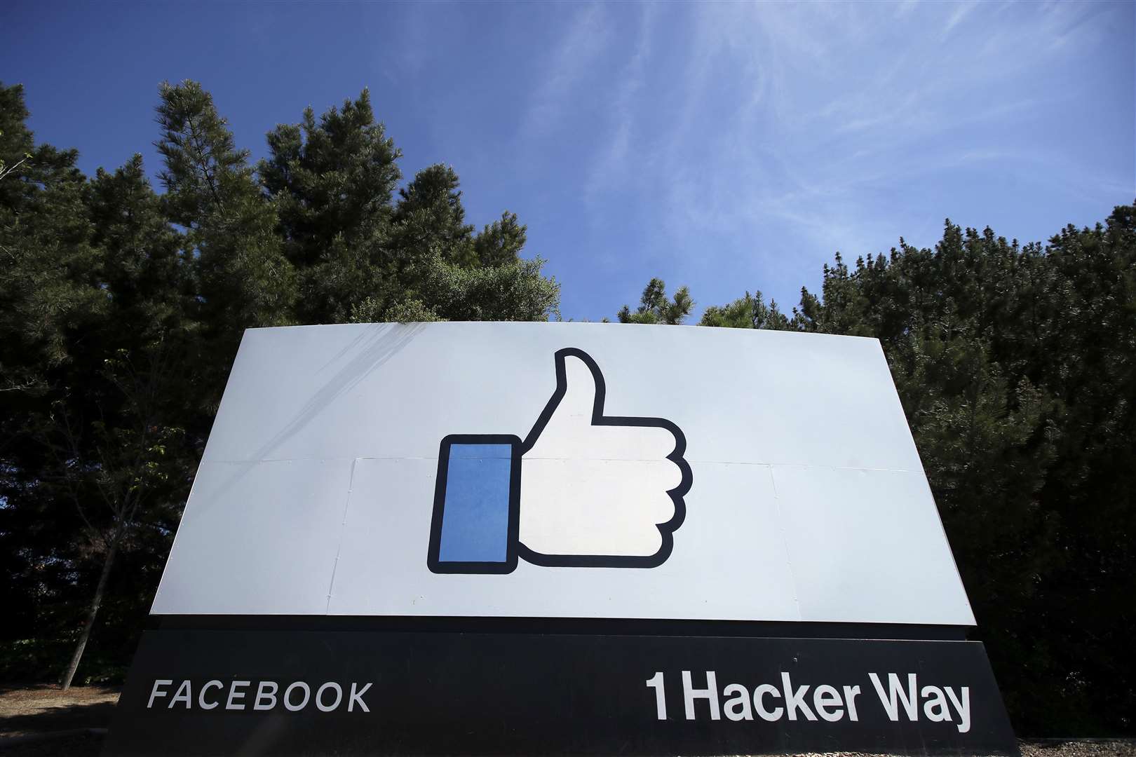 The thumbs up Like logo is shown on a sign at Facebook headquarters in Menlo Park, California (Jeff Chiu/AP)