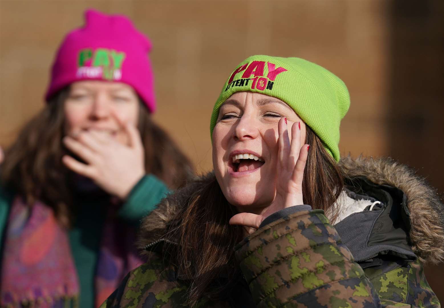 Members of the EIS union take part in a rally outside the Tramway in Glasgow (Andrew Milligan/PA)