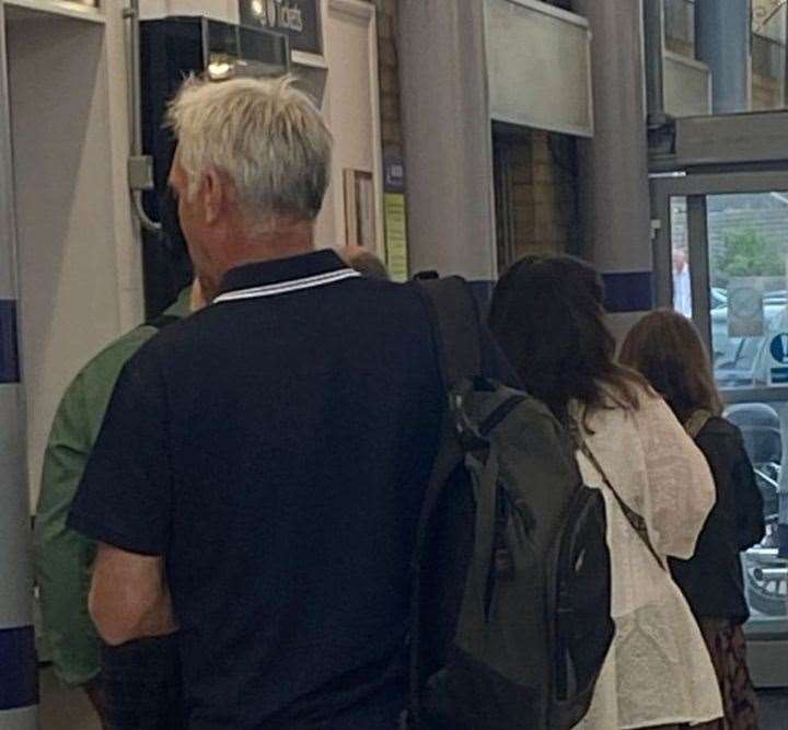 Passengers queue for the ticket office at Rainham train station. Picture: RMT