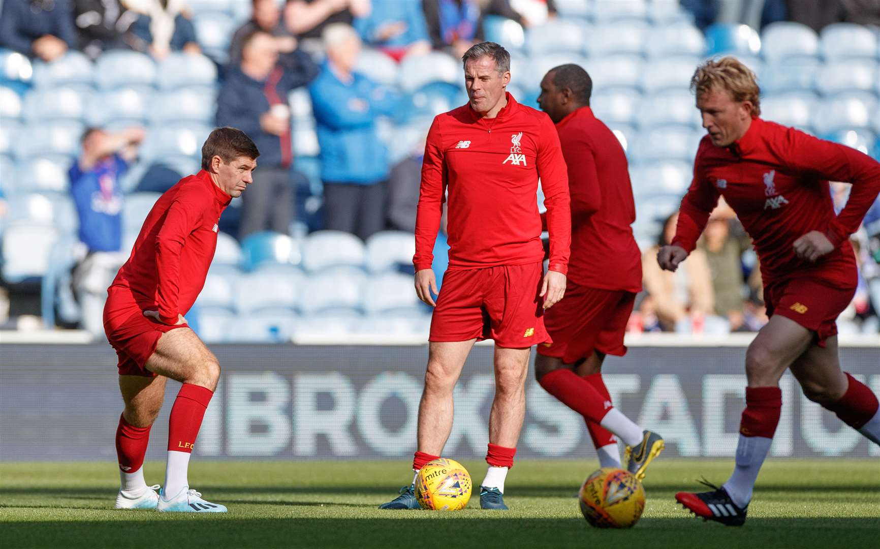 Jamie Carragher (centre) brings you witty insights into the beautiful game (Steve Welsh/PA Archive)