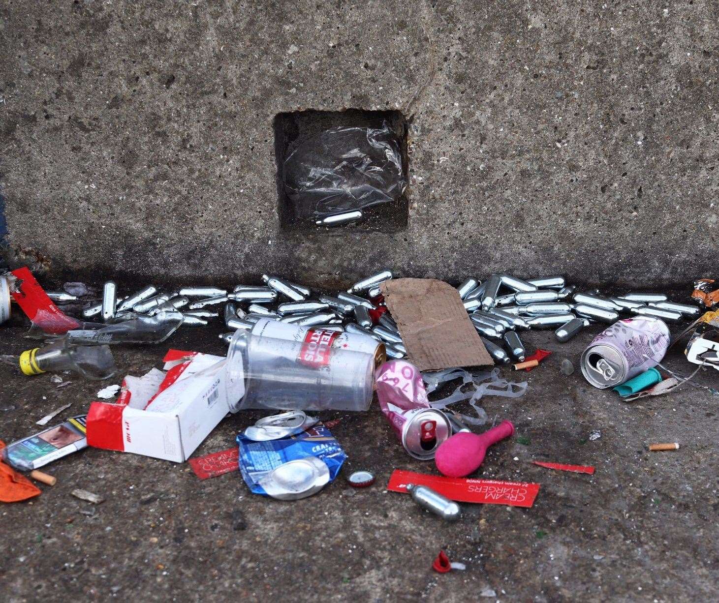 Litter on the west quay last month in Whitstable - including nitrous oxide canisters. Picture: Alex Hughes