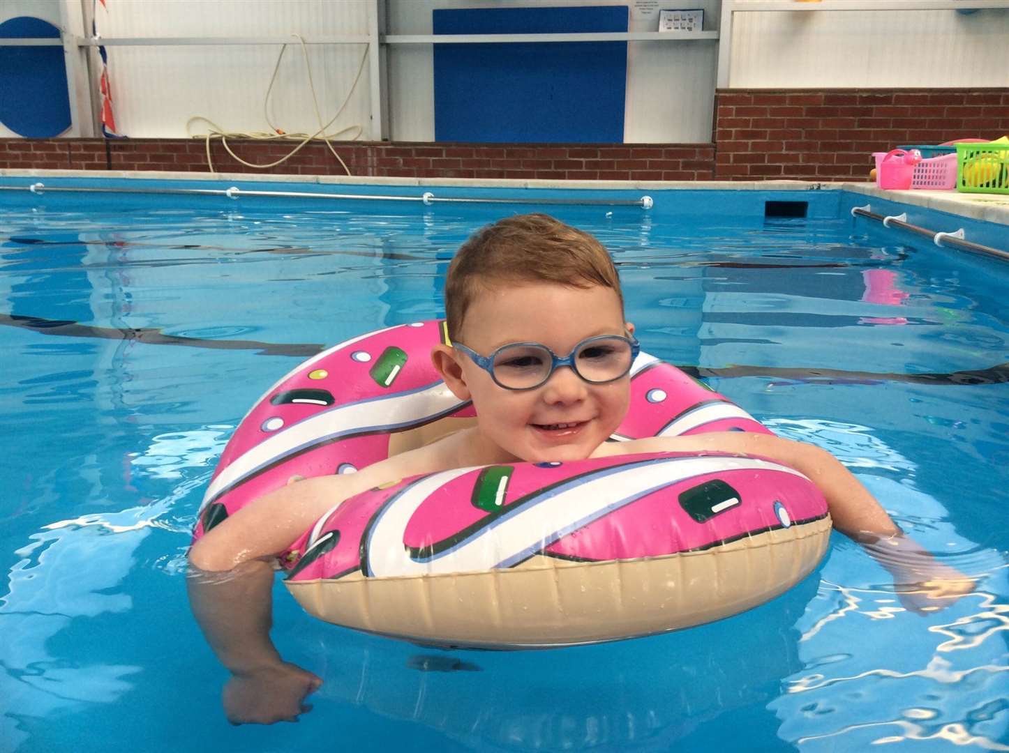 Teddy Baker has an unknown disorder and cerebral palsy - and is raising money for Joy Lane Swimming Pool. Picture: Sarah Baker