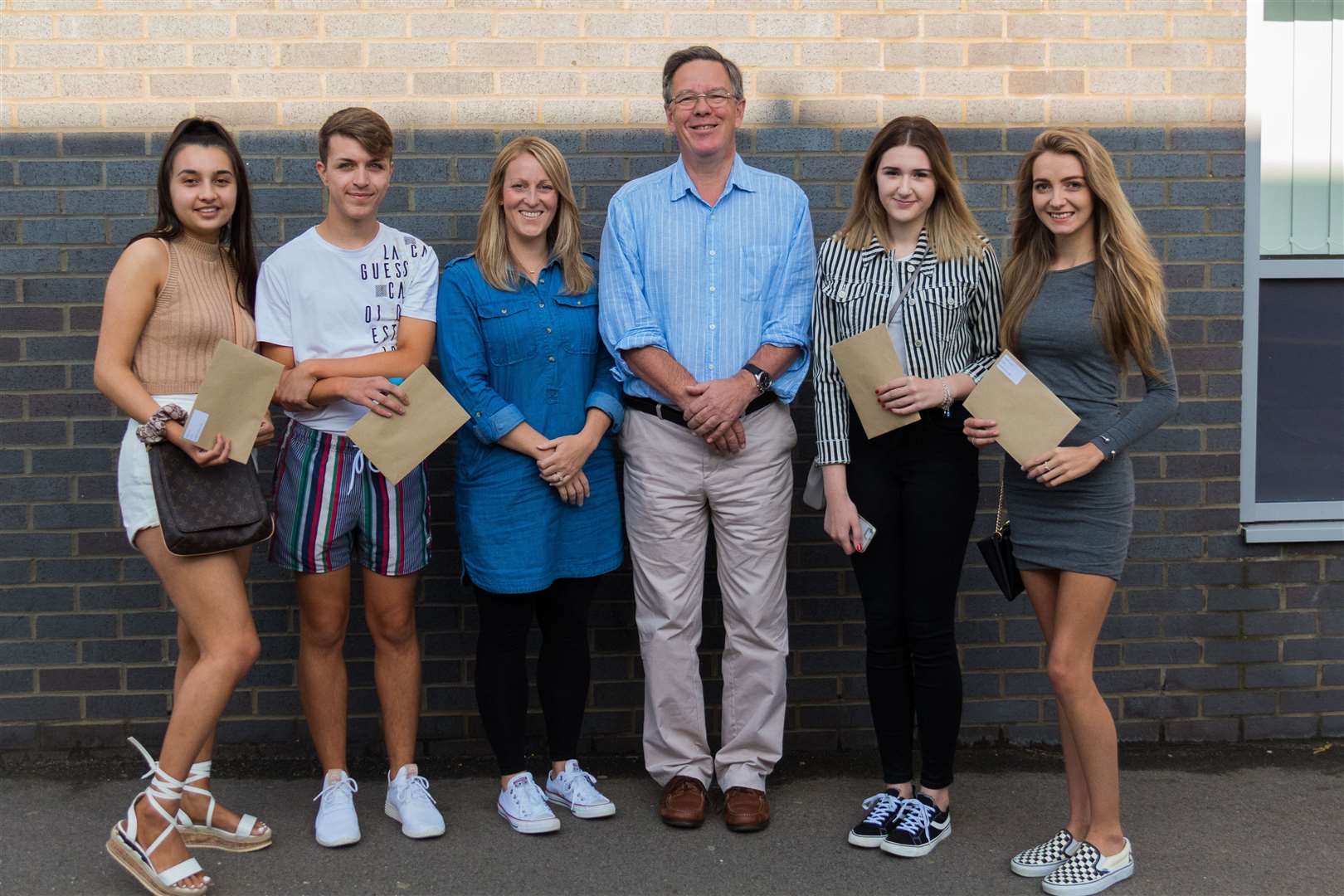 Kiran Devi, Joseph Williams, head of sixth form Gemma Davies, head teacher Alan Brookes, Emily Cale and Lauren Damiral at Fulston Manor