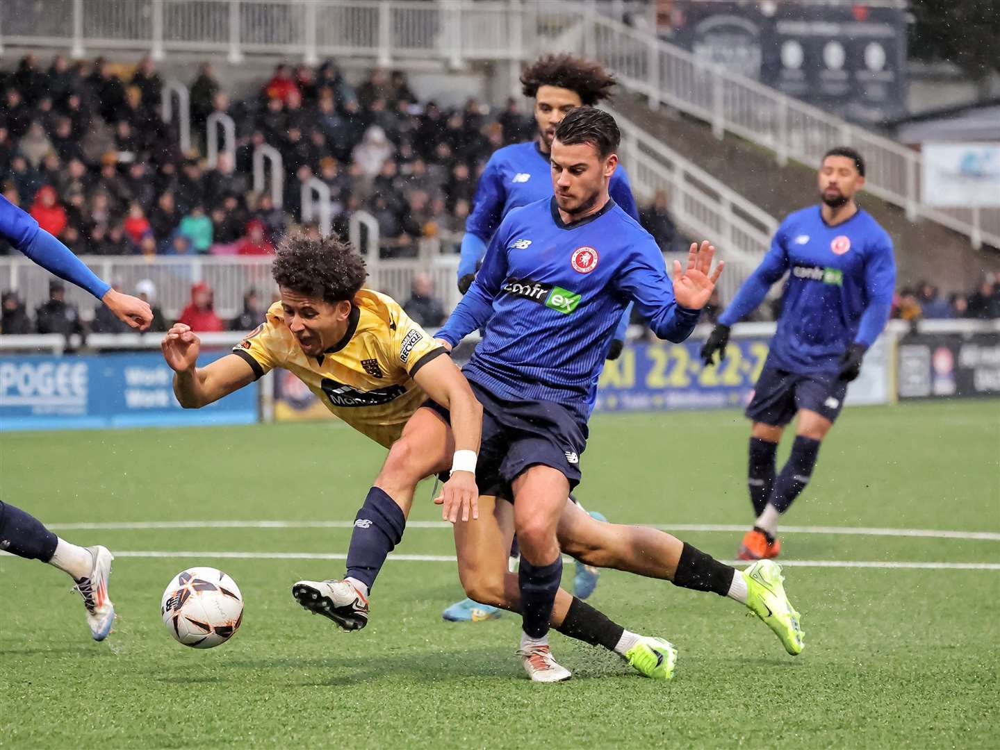 Welling, blue, gave everything for the cause in their defeat at Maidstone. Picture: Helen Cooper