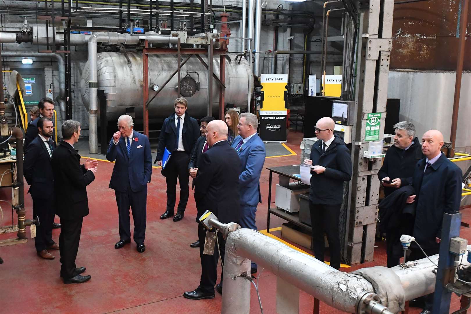 The Prince of Wales meets workers during a visit to CycloneCC technology at Carbon Clean, Doosan Babcock, Renfrew (Andy Buchanan/PA)