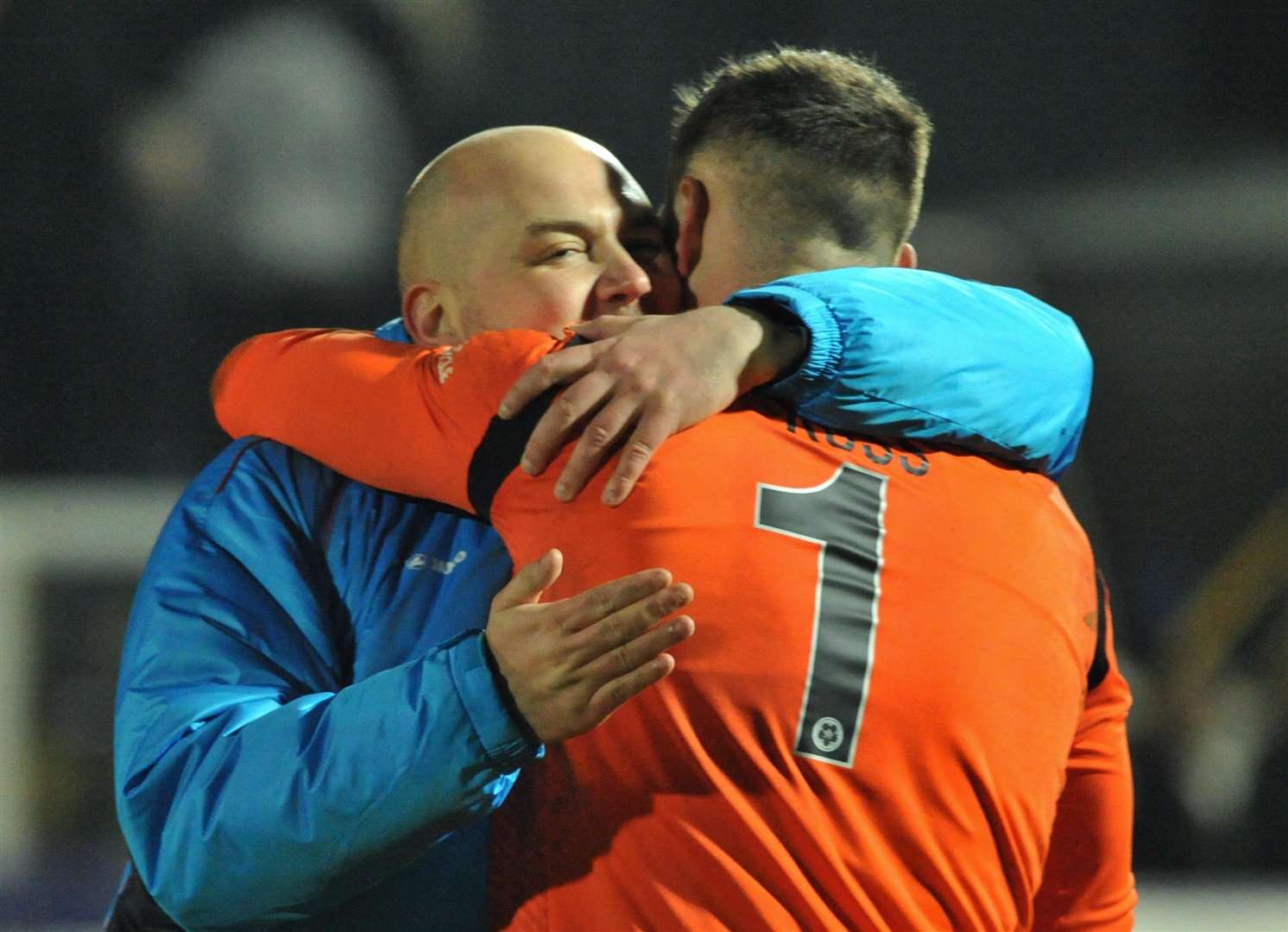 Caretaker boss Tristan Lewis embraces Ethan Ross after the final whistle at Hartlepool Picture: Steve Terrell