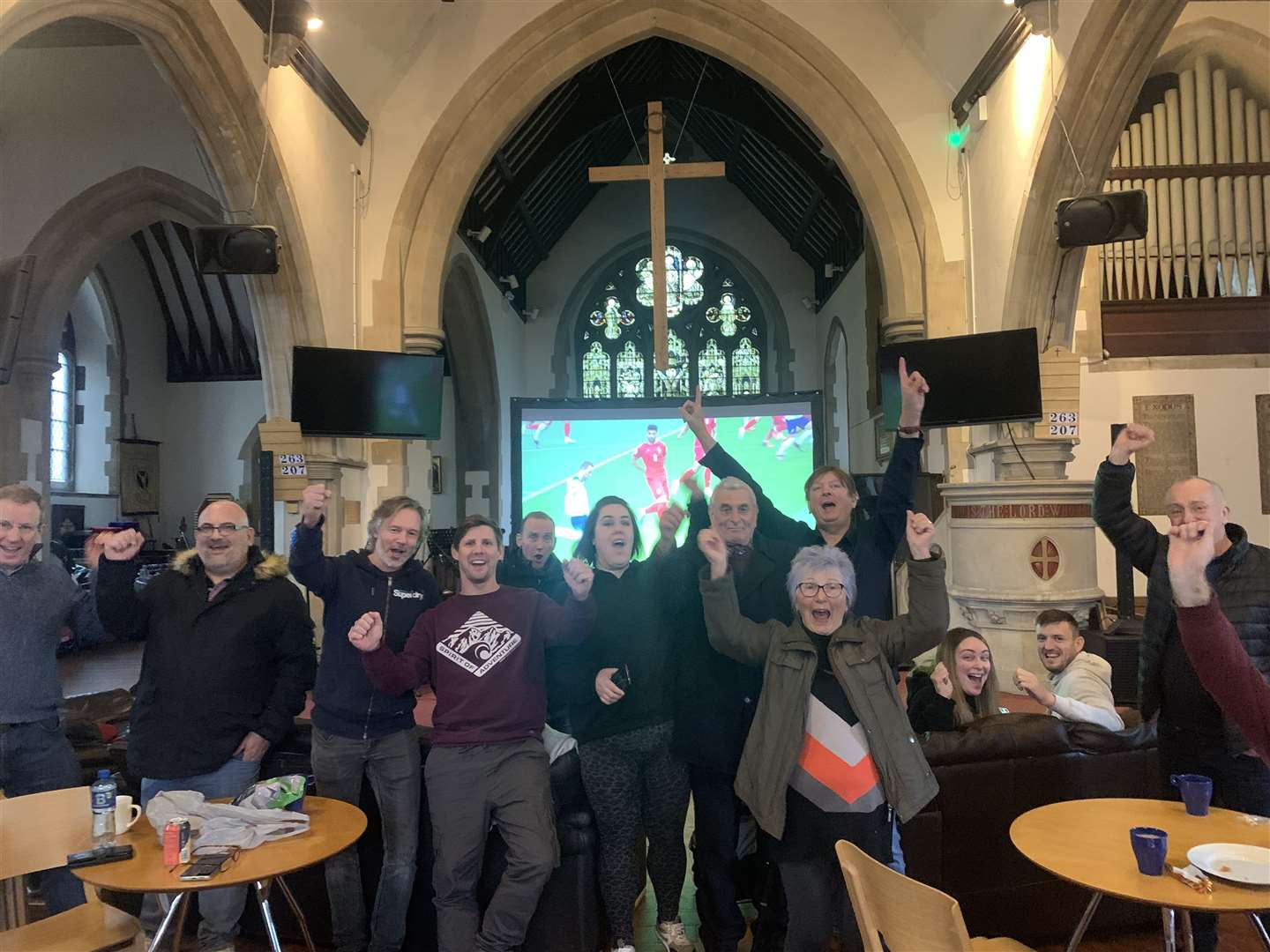 The congregation cheers the 6-2 victory over Iran