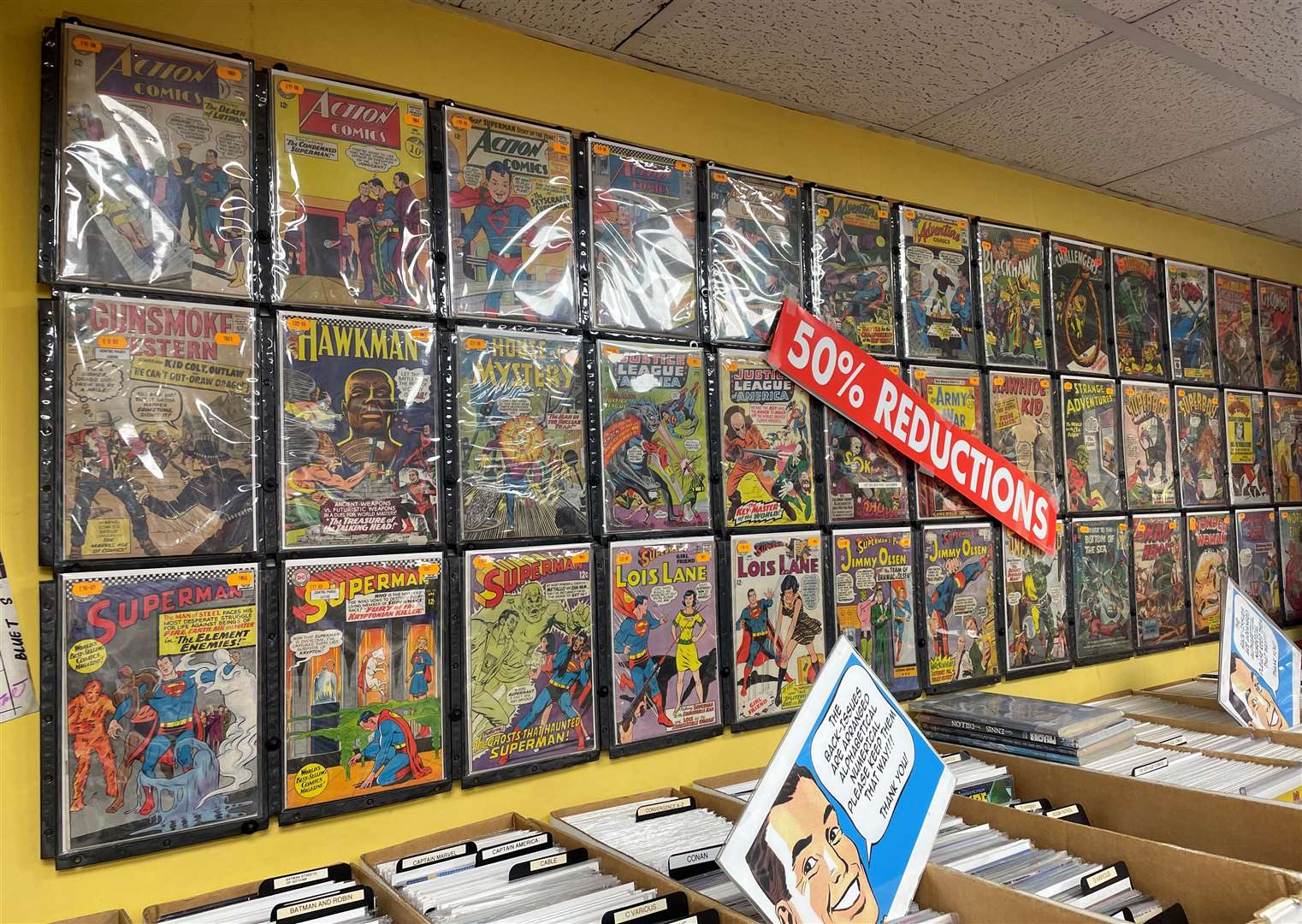 The shop sells American comic books, including old and new editions