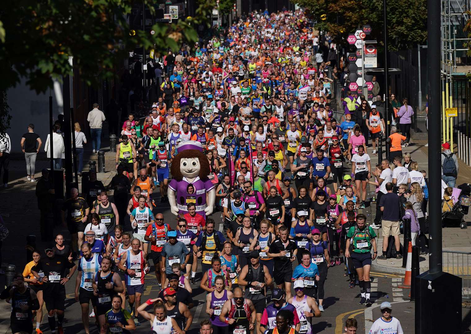 Runners during the London Marathon last year (Yui Mok/PA)