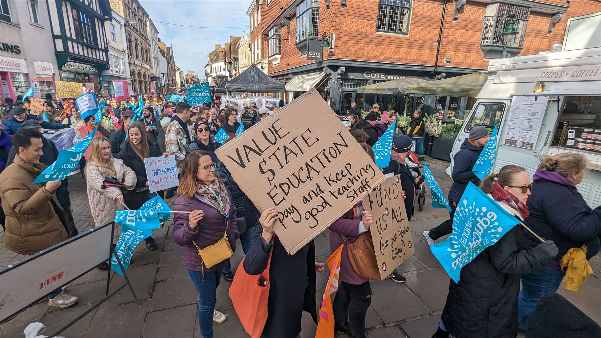 Teachers go on a march through Canterbury as part of a day of national strikes