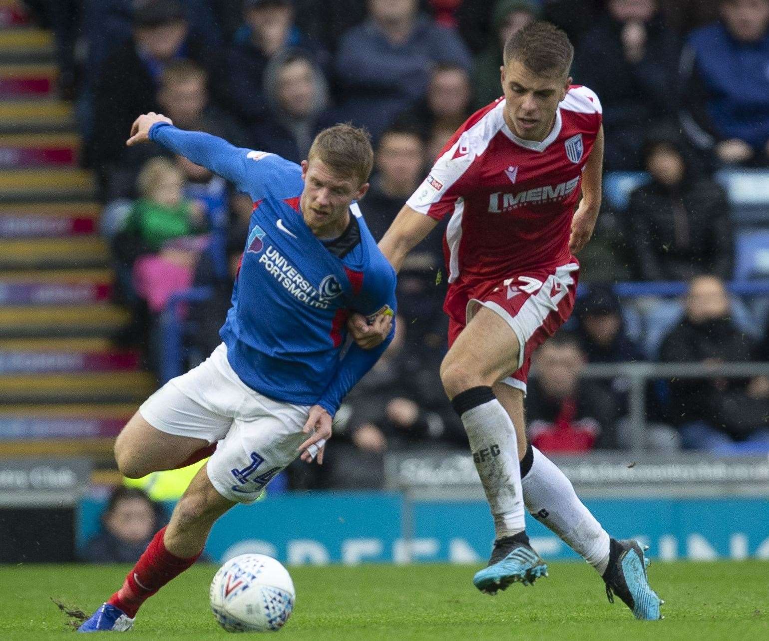 Jack Tucker does battle with Portsmouth substitute Andy Cannon Picture: @KentProImages