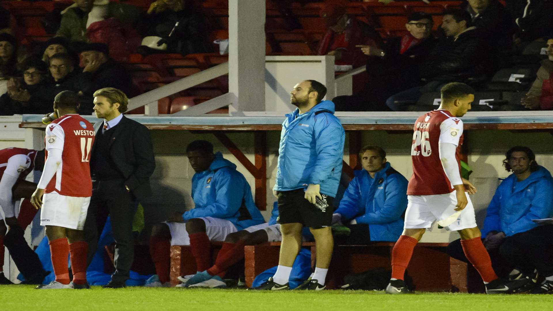 Chris Bush (right) trudges off after being shown a red card Picture: Andy Payton