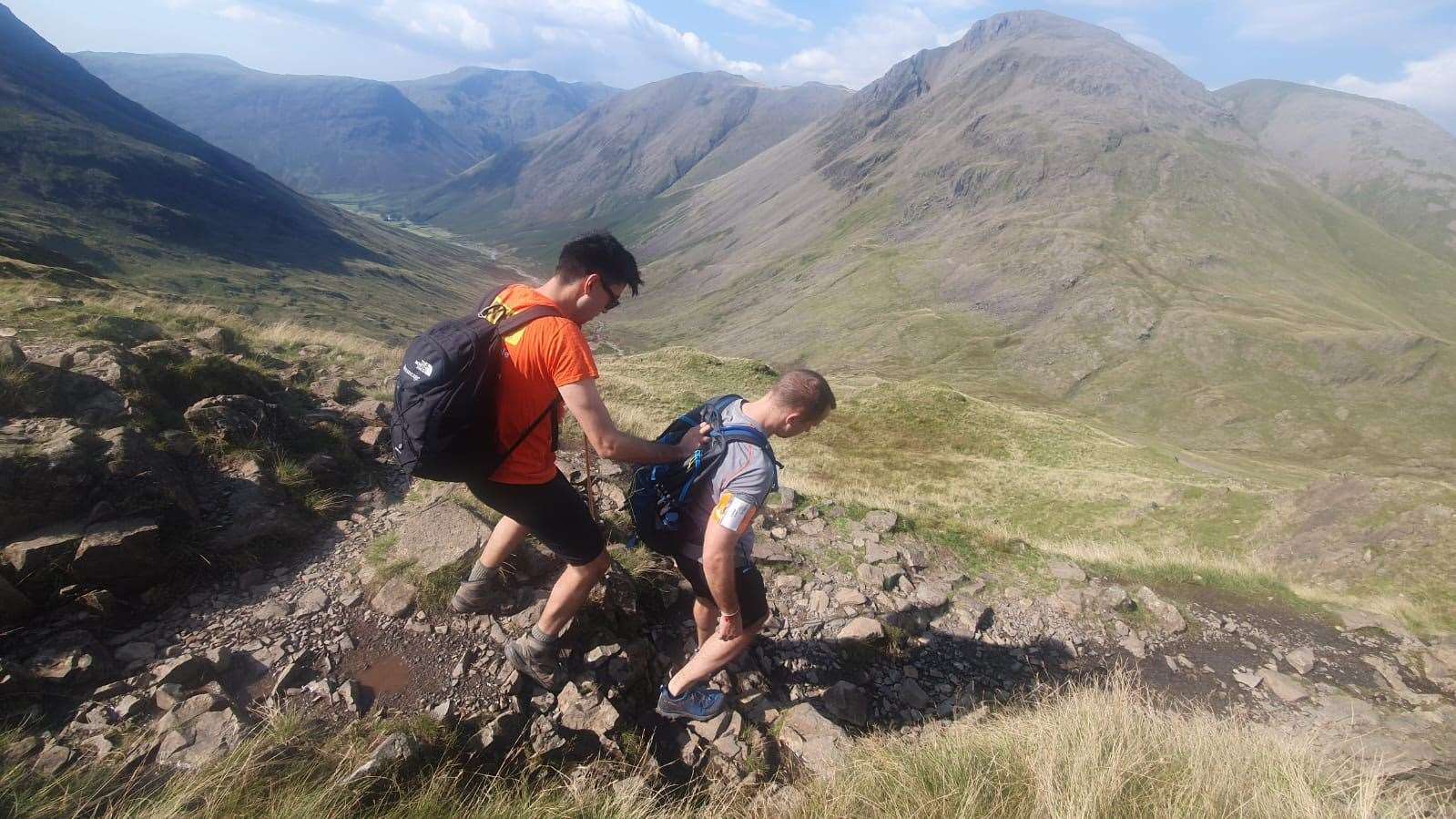 Michael Smith had to hold onto Jack Stacy’s rucksack, shoulder or arm to help guide him through difficult terrain (SeeAbility)