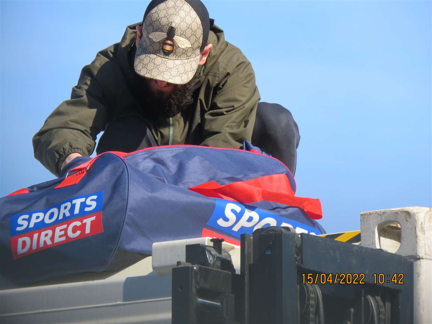 A surveillance shot of Ibra on top of the shipping container (NCA/PA)