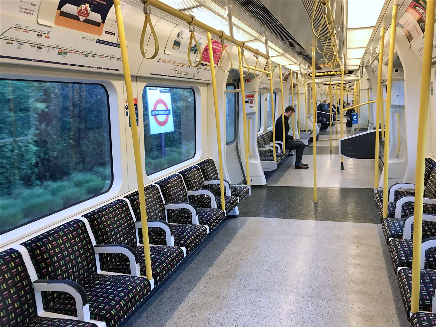 A sparsely-filled District Line carriage on London Underground (Martin Keene/PA)