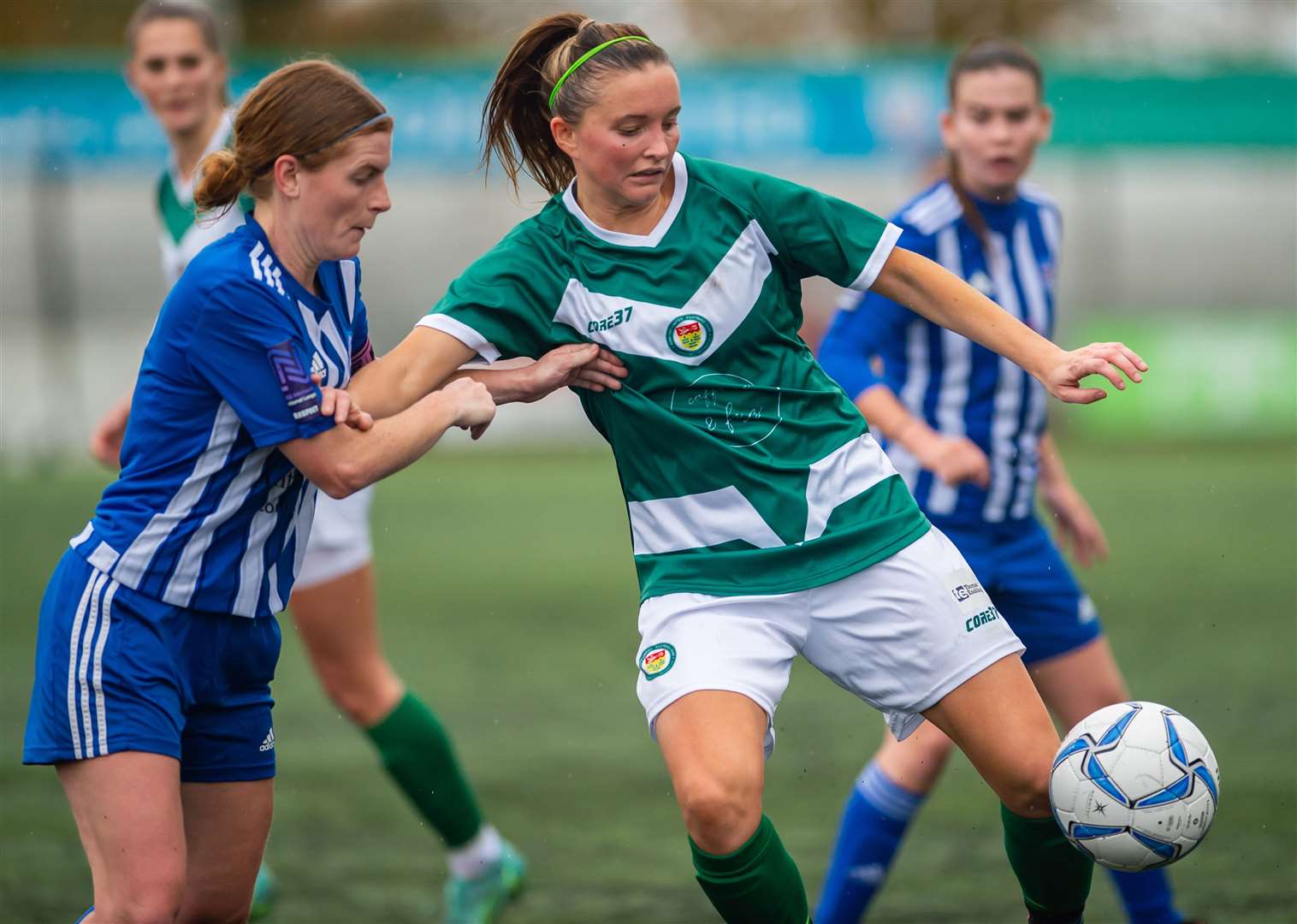 Ashford United Ladies (green) keep Actonians at arm's length. Picture: Ian Scammell