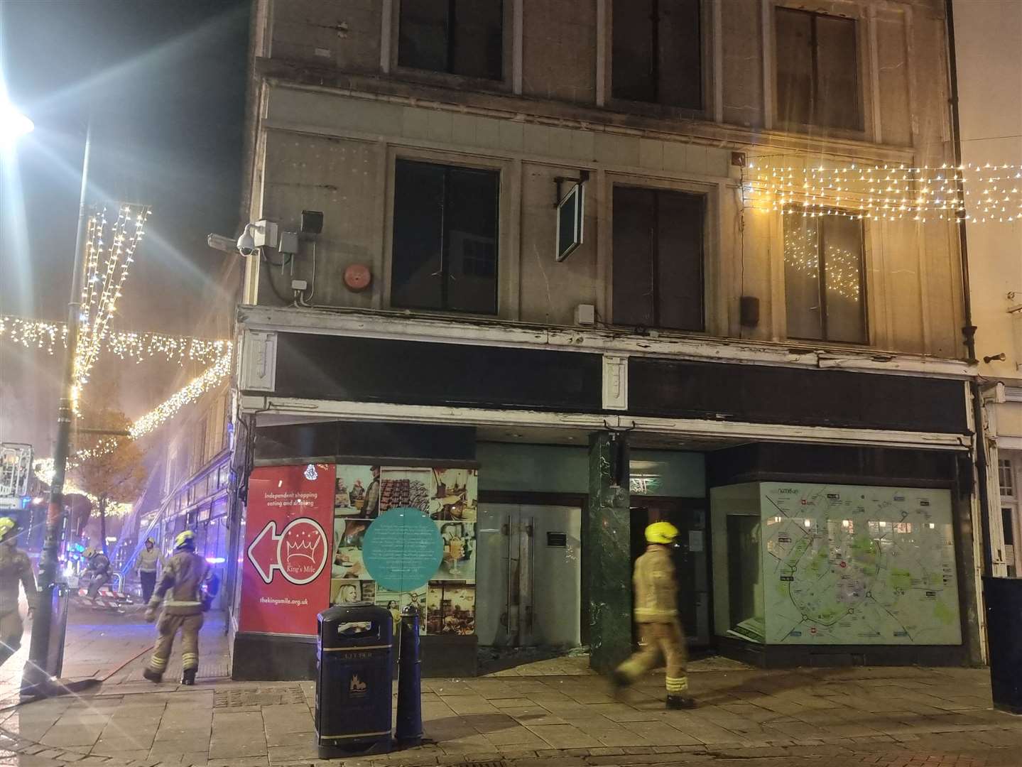 Fire crews outside the former Debenhams in Canterbury High Street last night. Picture: Lukas Järvinen