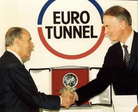 ANNIVERSARY: Chief executive of Eurotunnel (right) shakes hands with French President Francois Mitterrand in 1994.