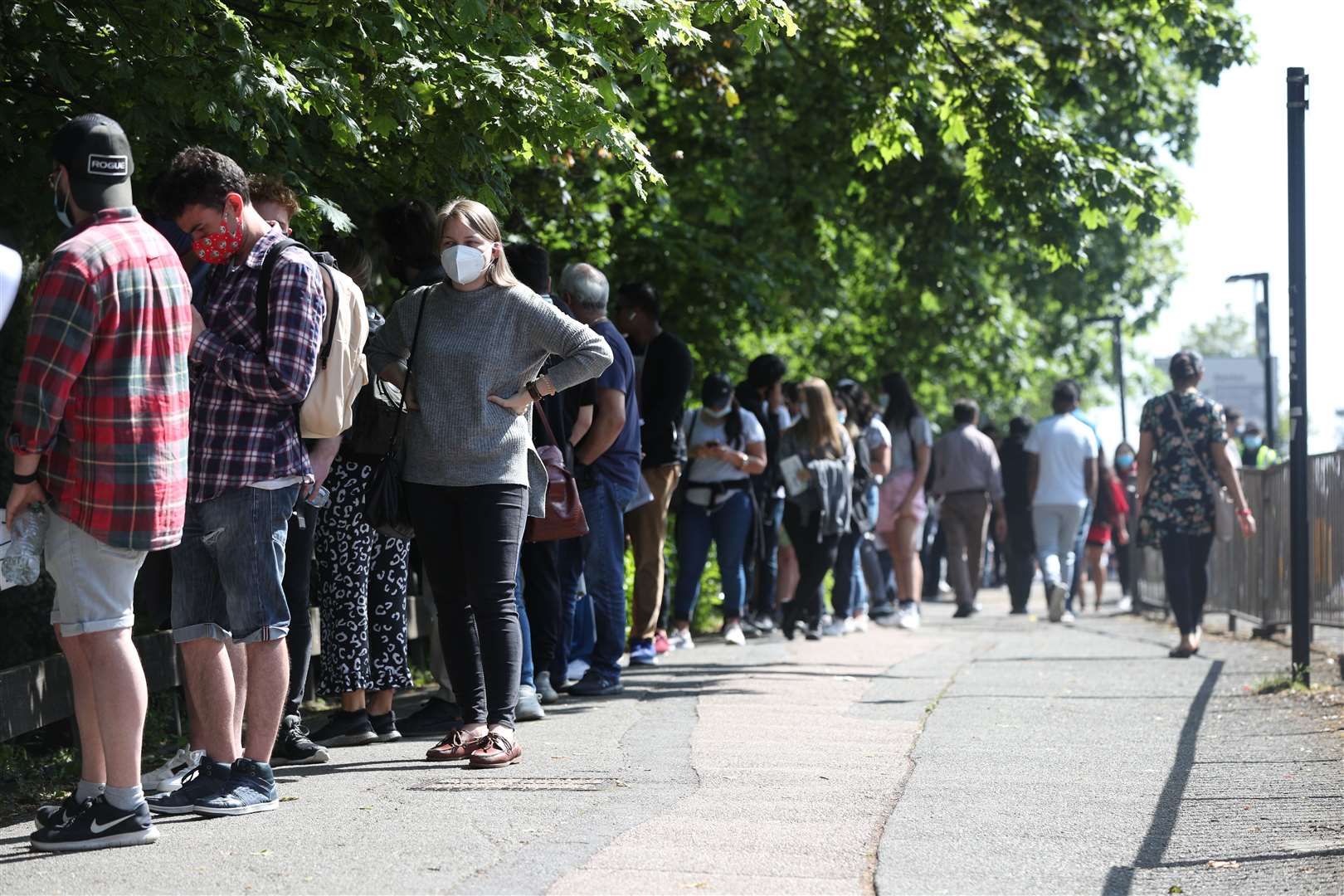 People queuing for Covid-19 vaccine (Jonathan Brady/PA)