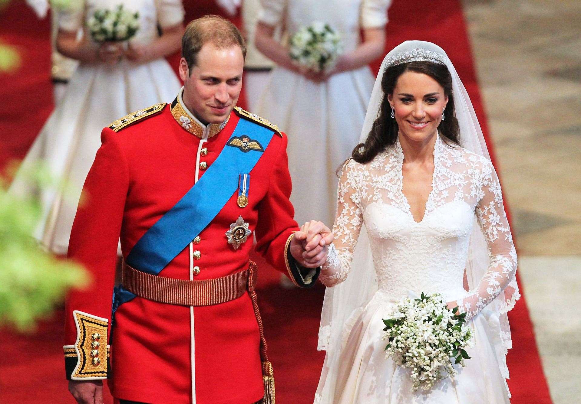 Prince William and Kate walking down the aisle at Westminster Abbey following their marriage (David Jones/PA Images)