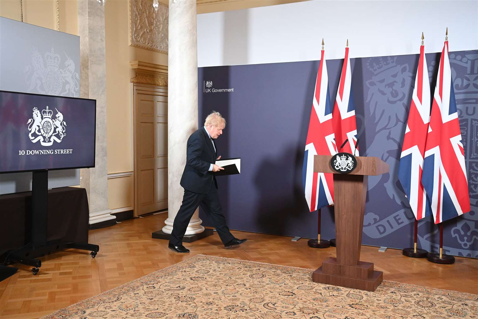 Prime Minister Boris Johnson arrives for a media briefing in Downing Street, London, on the agreement of a post-Brexit trade deal (Paul Grover/Daily Telegraph/PA)