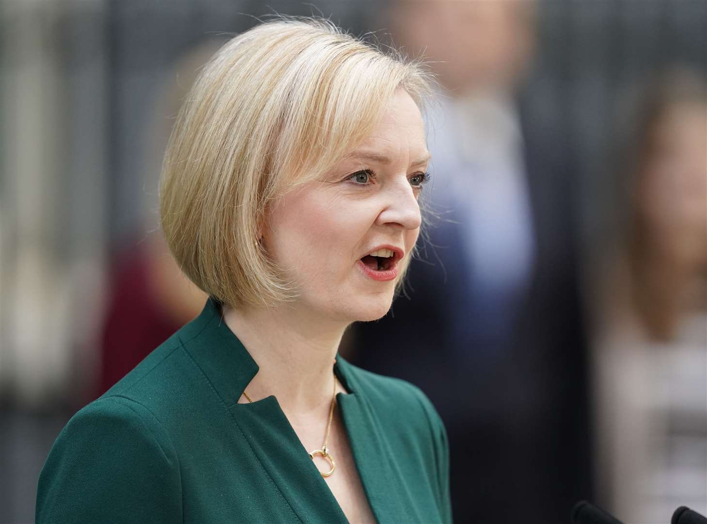 Ms Truss delivered a speech outside Downing Street before meeting the King at Buckingham Palace (James Mannng/PA)