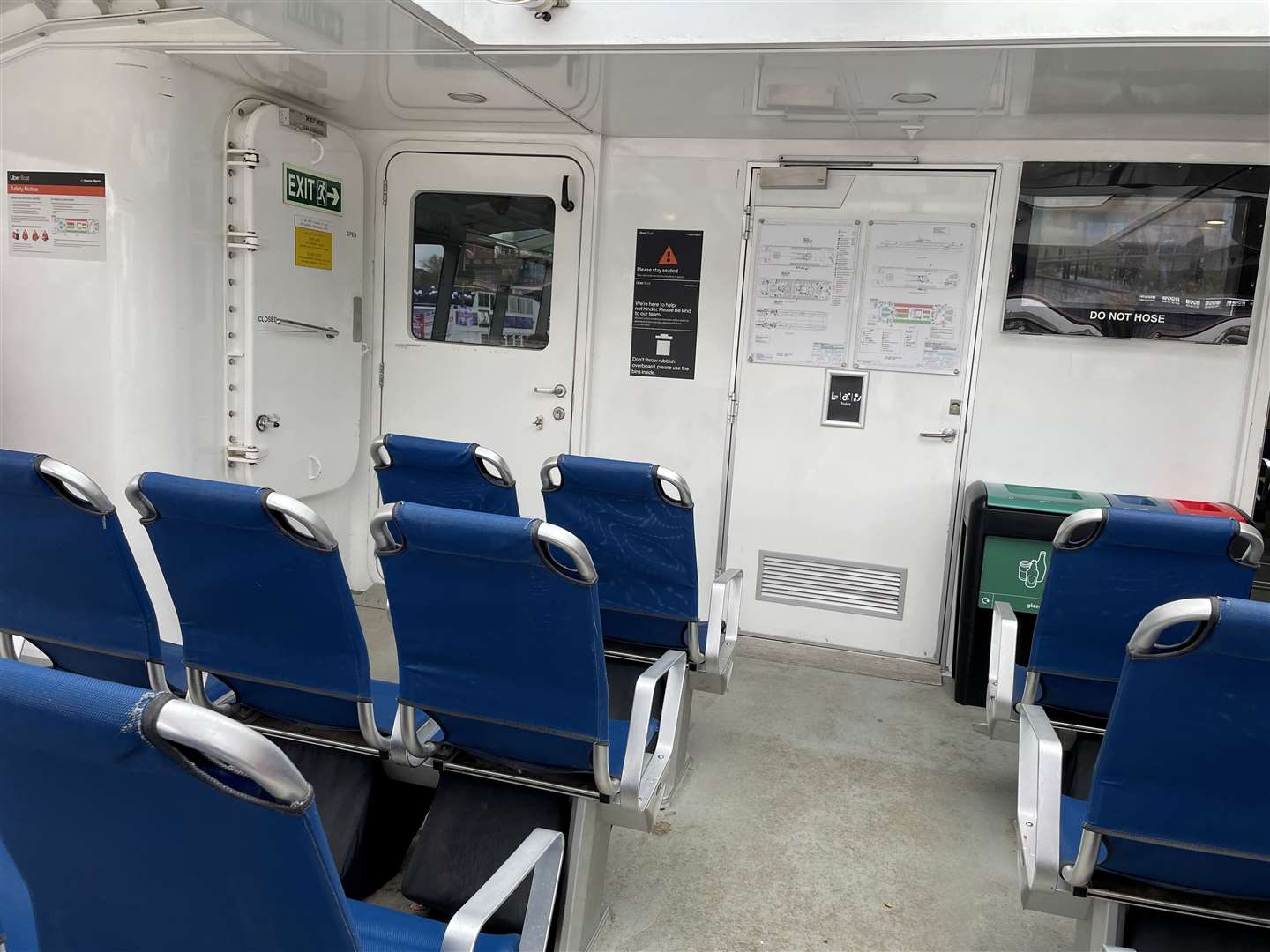 The outdoor seating area at the back of the boats