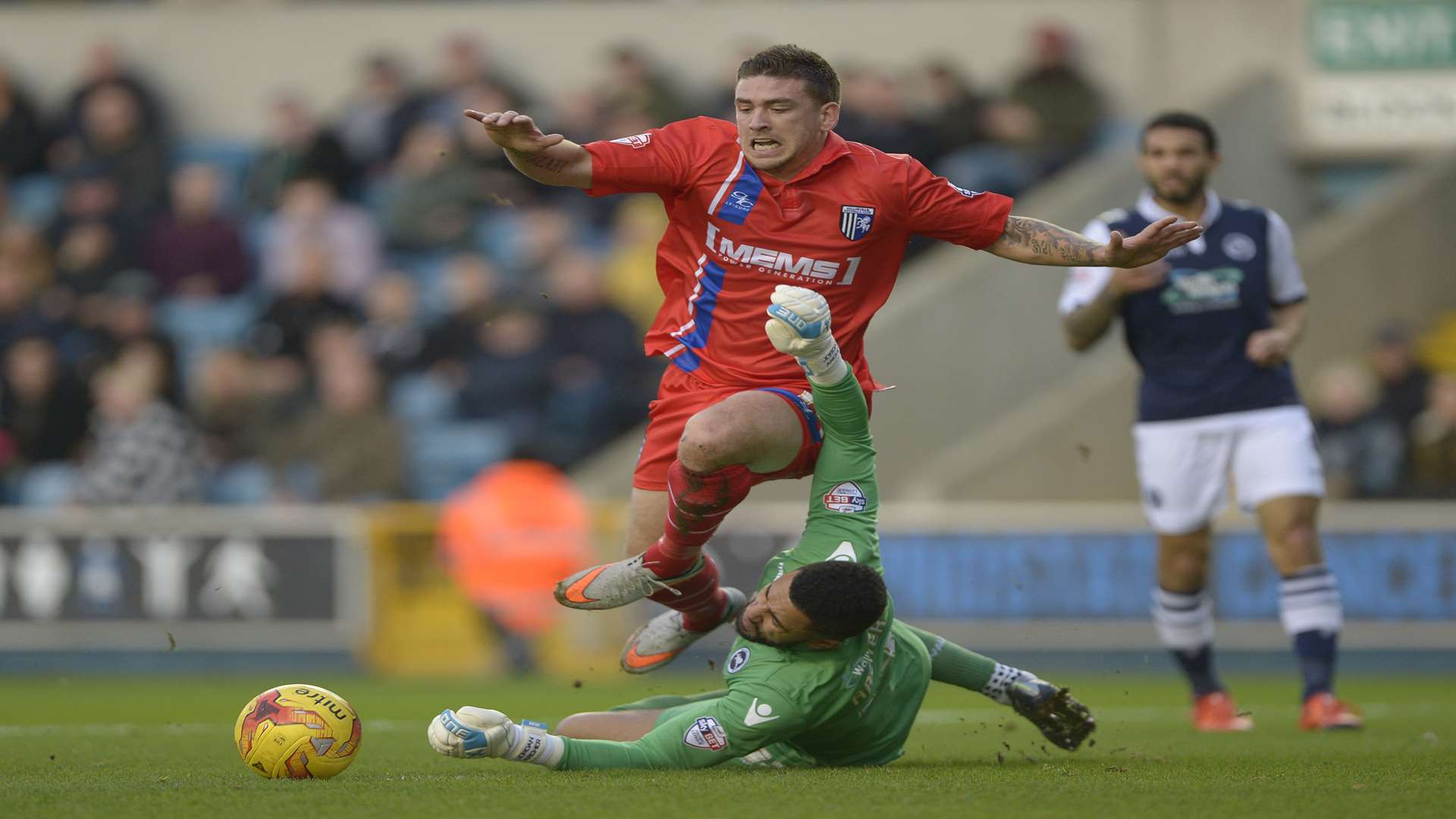 Cody McDonald suffers a broken foot in collision with Millwall keeper Jordan Archer