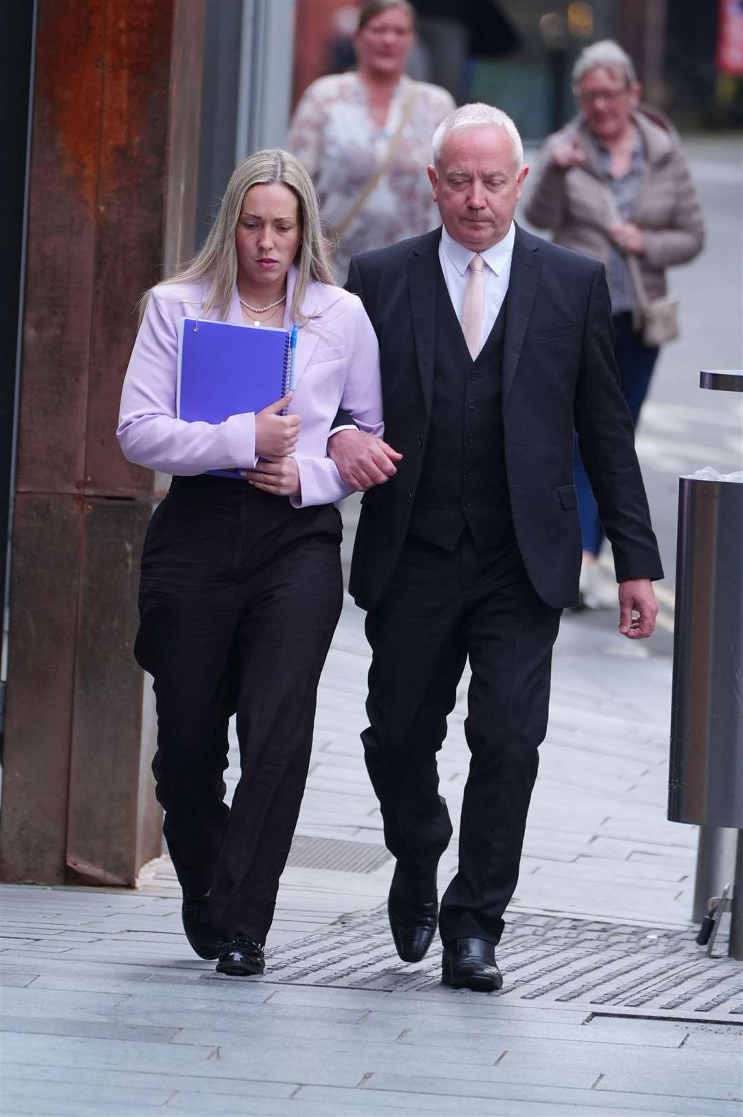 School teacher Rebecca Joynes arrives at Manchester Crown Court, where she is charged with six counts of sexual activity with two teenagers, including two counts of sexual activity while being a teacher in a position of trust (Peter Byrne/PA)