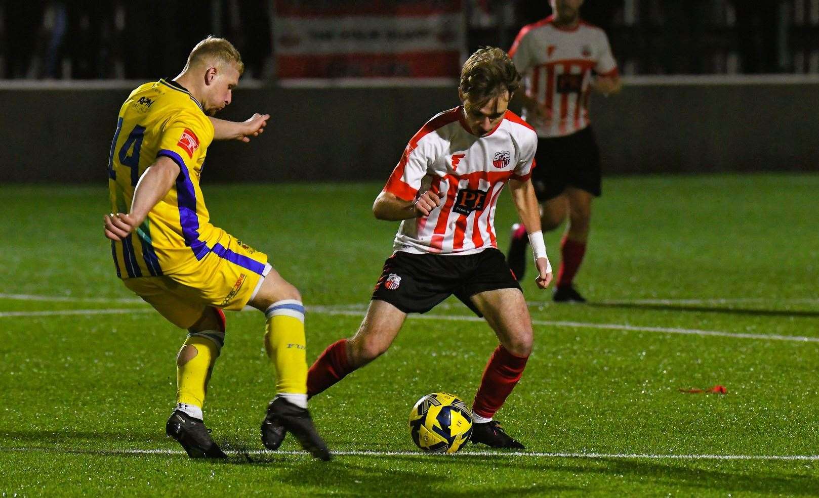 Sittingbourne's Gabriel Piorkowski up against Sheppey substitute Jacob Lambert. Picture: Marc Richards