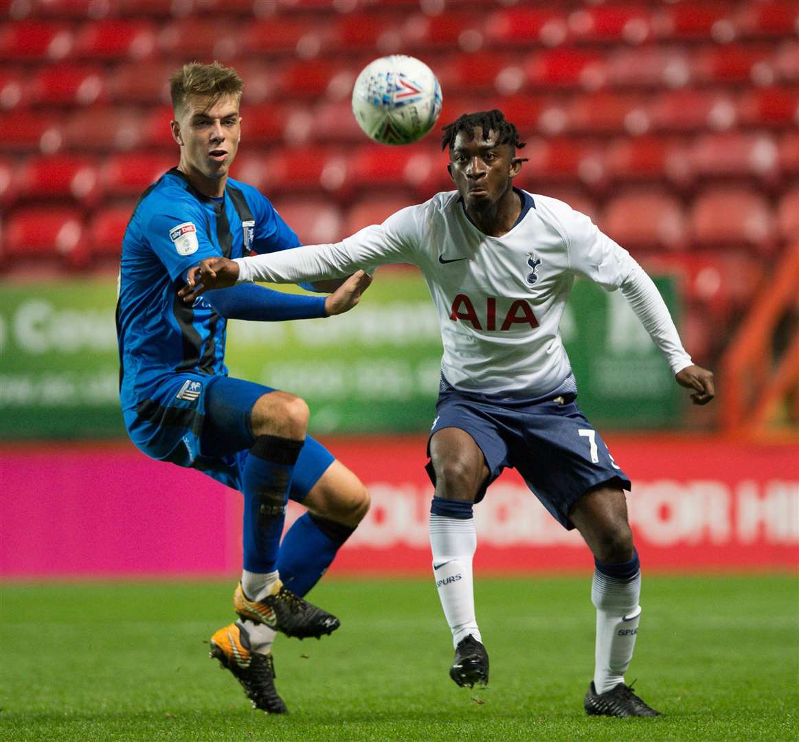 Jack Tucker challenges with Tottenham's Rodel Richards last season in the EFL Trophy Picture: Ady Kerry