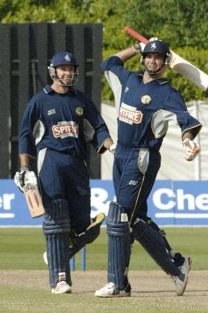 Justin Kemp celebrates victory with Martin van Jaarsveld after cracking seven sixes in 11 balls at Tunbridge Wells. Picture by MATTHEW WALKER