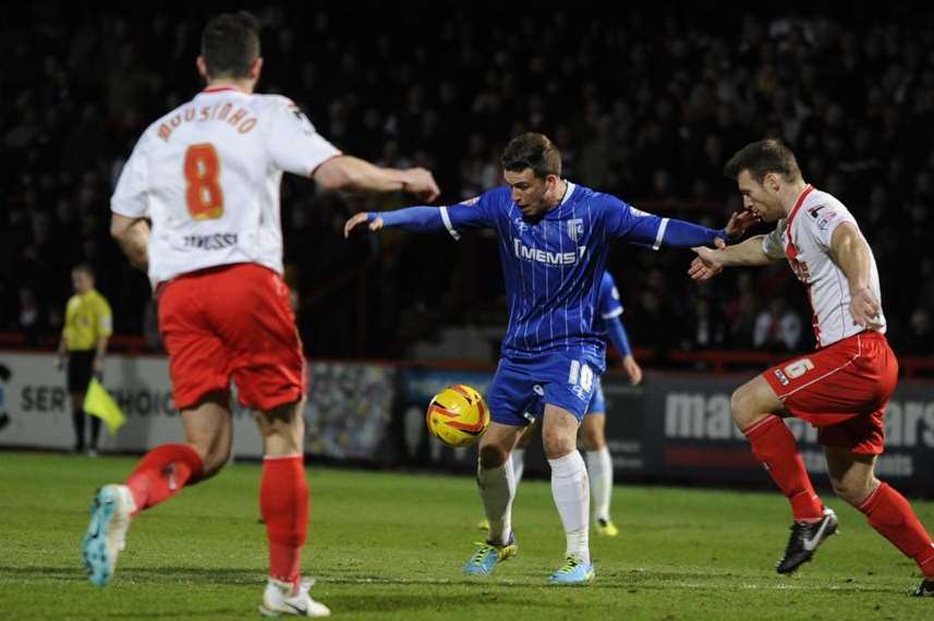 Cody McDonald holds off Luke Jones at Stevenage on Tuesday. Picture: Barry Goodwin