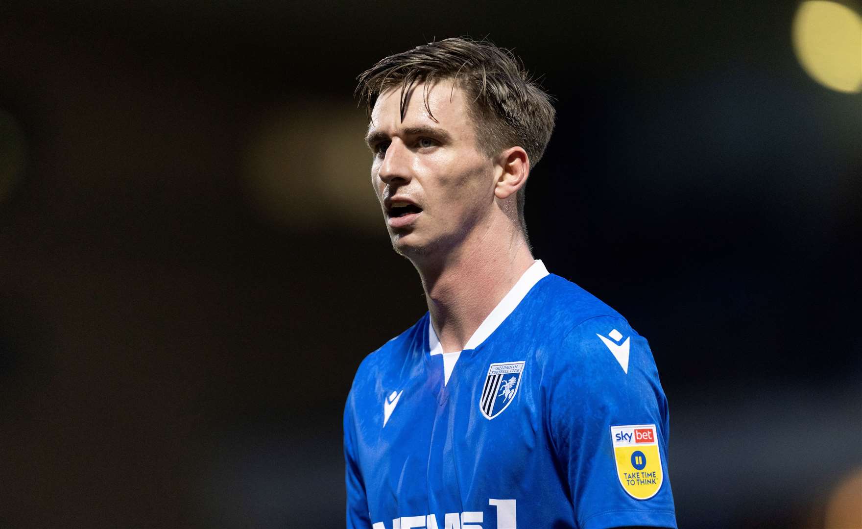 Gillingham striker Oli Hawkins was taken off at Cambridge United after an injury set-back