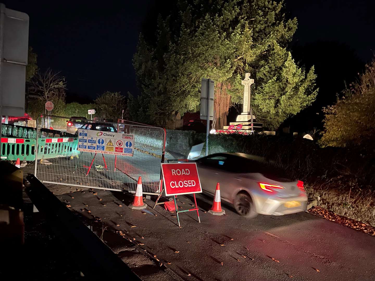 Traffic bypassing the road closed sign last night