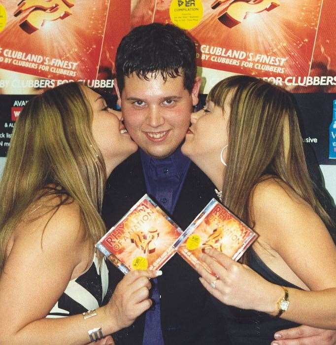 Pop Idol's Rik Waller gets a kiss from Ikon clubgoers in Maidstone in 2002. Picture: Ikon